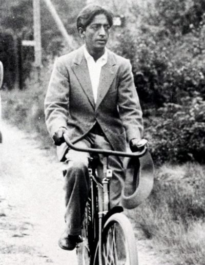 Krishnamurti riding a bicycle