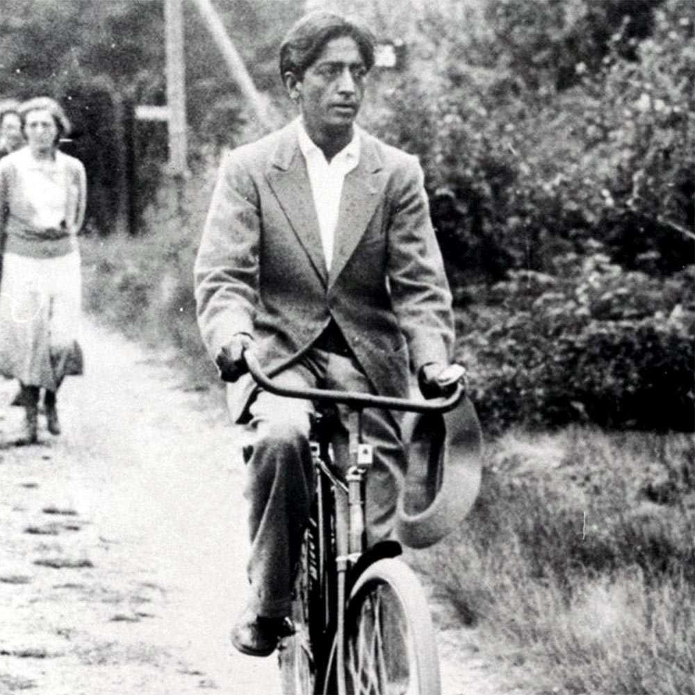 Krishnamurti riding a bicycle