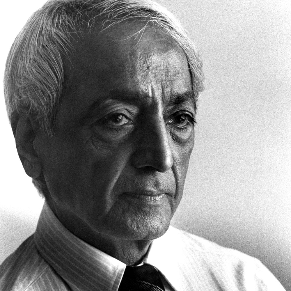 Three-quarters portrait photo of Krishnamurti