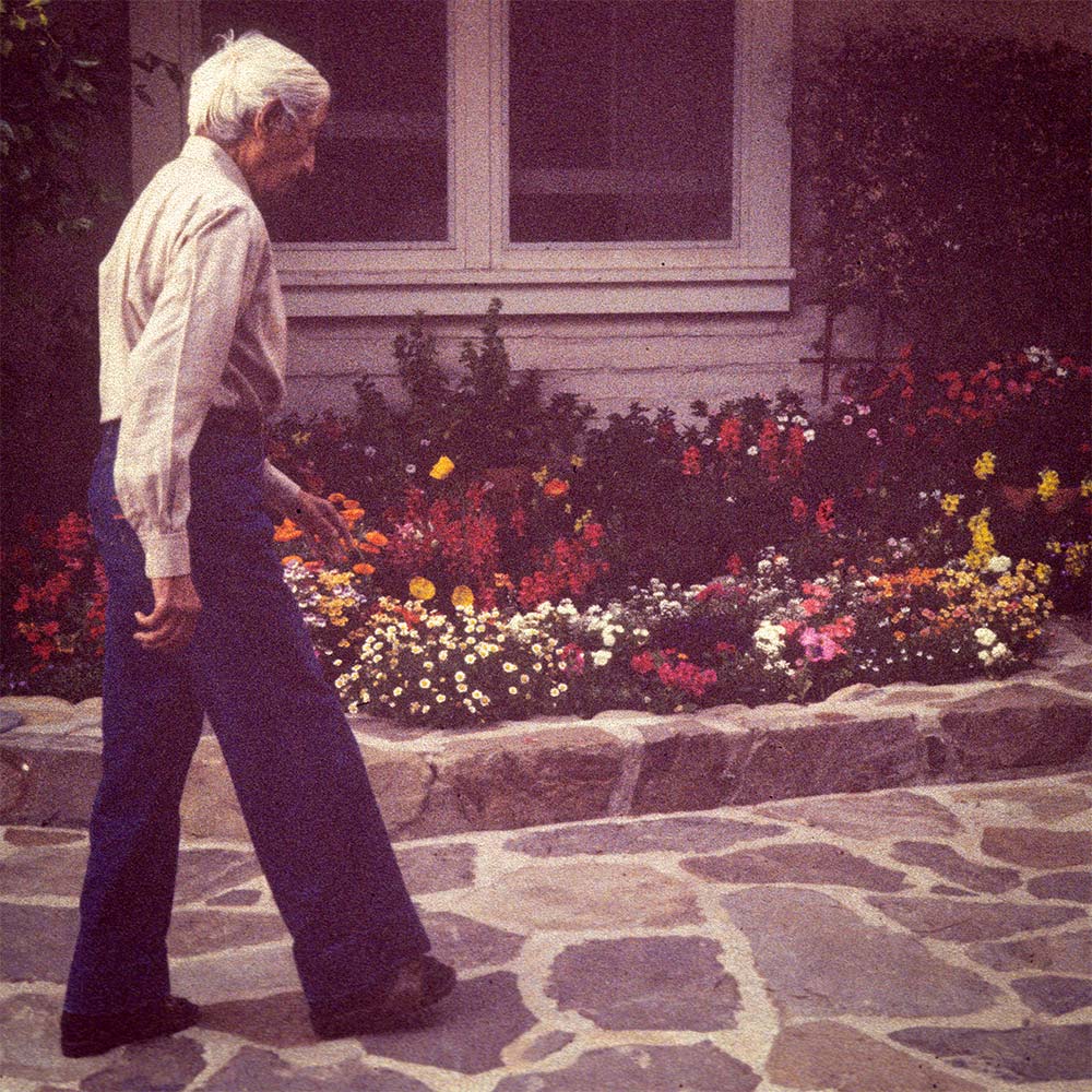 Krishnamurti smiling at the camera