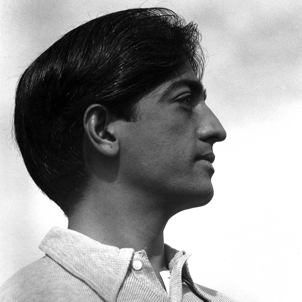 Krishnamurti smiling at the camera