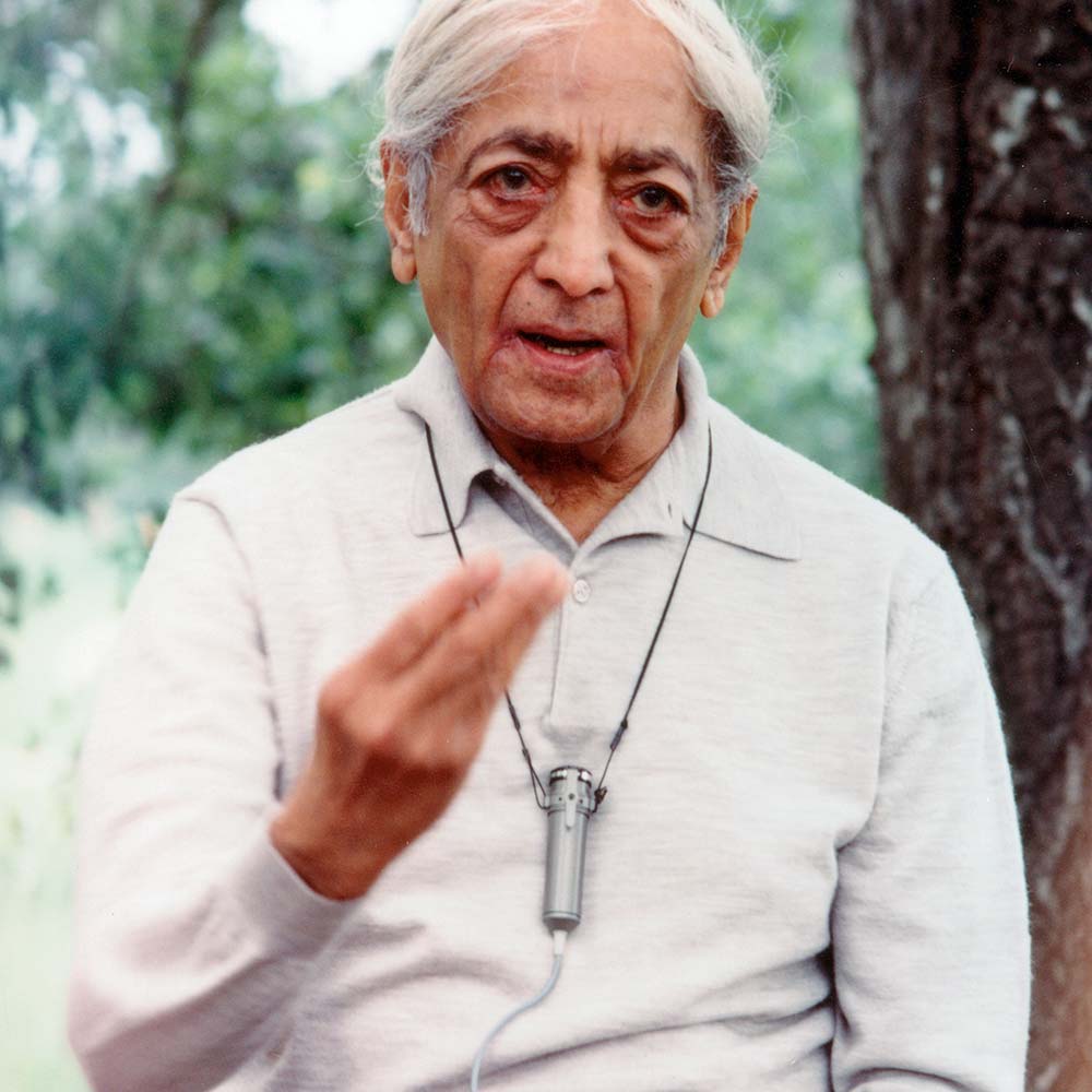krishnamurti Krishnamurti smiling at the camera