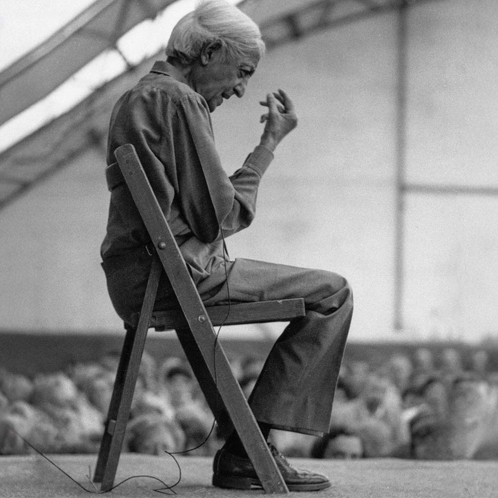 Krishnamurti smiling at the camera